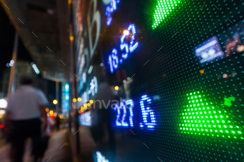 Stock market quotes with city scene reflect on glass stock photo NULLED