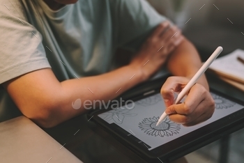 Graphic designer freelancer working overtime at night. stock photo NULLED