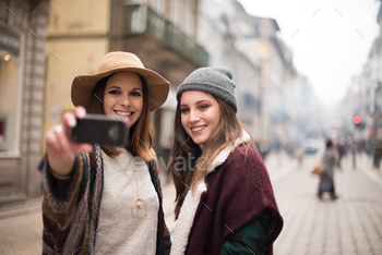 Women taking selfies stock photo NULLED