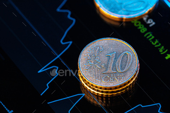 Euro coin on stock chart. Financial investment concept. stock photo NULLED