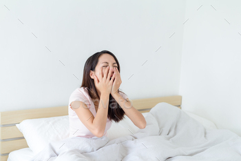 Depressed women in bed stock photo NULLED