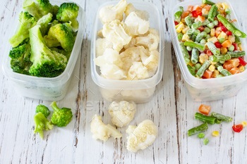 Stocks of food for the winter. Containers with frozen vegetables stock photo NULLED