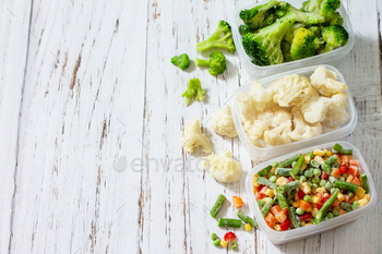 Stocks of food for the winter. Containers with frozen vegetables stock photo NULLED