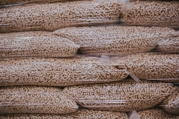 Closeup shot of stocked  pig pellet on a warehouse stock photo NULLED
