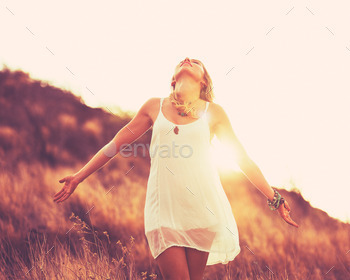 Fashion Woman at Sunset stock photo NULLED