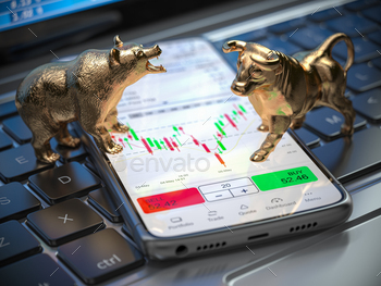 Golden bull and bear as symbols of stock market on a smartphone stock photo NULLED