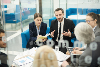Group Discussion in Meeting stock photo NULLED