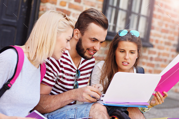 Group of students with laptop stock photo NULLED