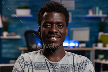 Portrait of african american freelancer looking into camera stock photo NULLED