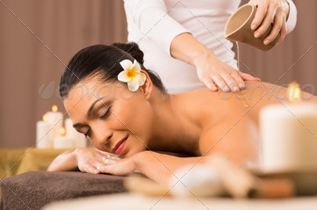 Woman Having A Back Oil Massage stock photo NULLED