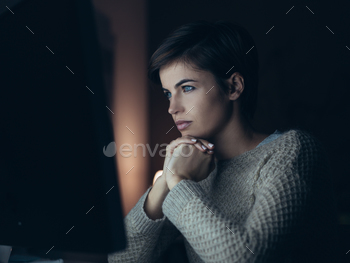 Woman connecting at night stock photo NULLED