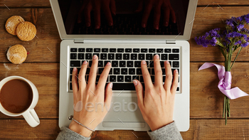 Woman typing stock photo NULLED