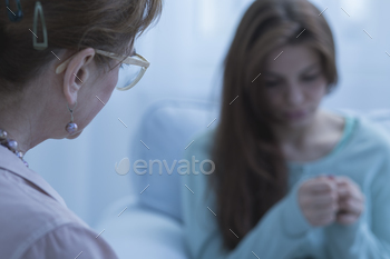 Woman with depression having help stock photo NULLED