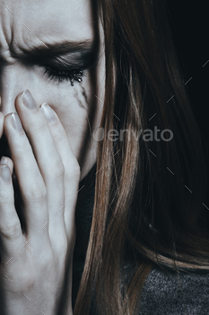 Woman with smudged makeup stock photo NULLED