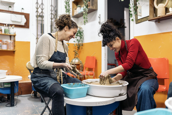 Women in Pottery Class stock photo NULLED