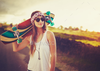 Young Woman with Skateboard stock photo NULLED