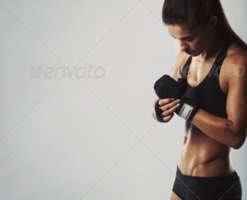 Young woman getting ready for workout stock photo NULLED