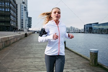 Young woman out for a jog stock photo NULLED